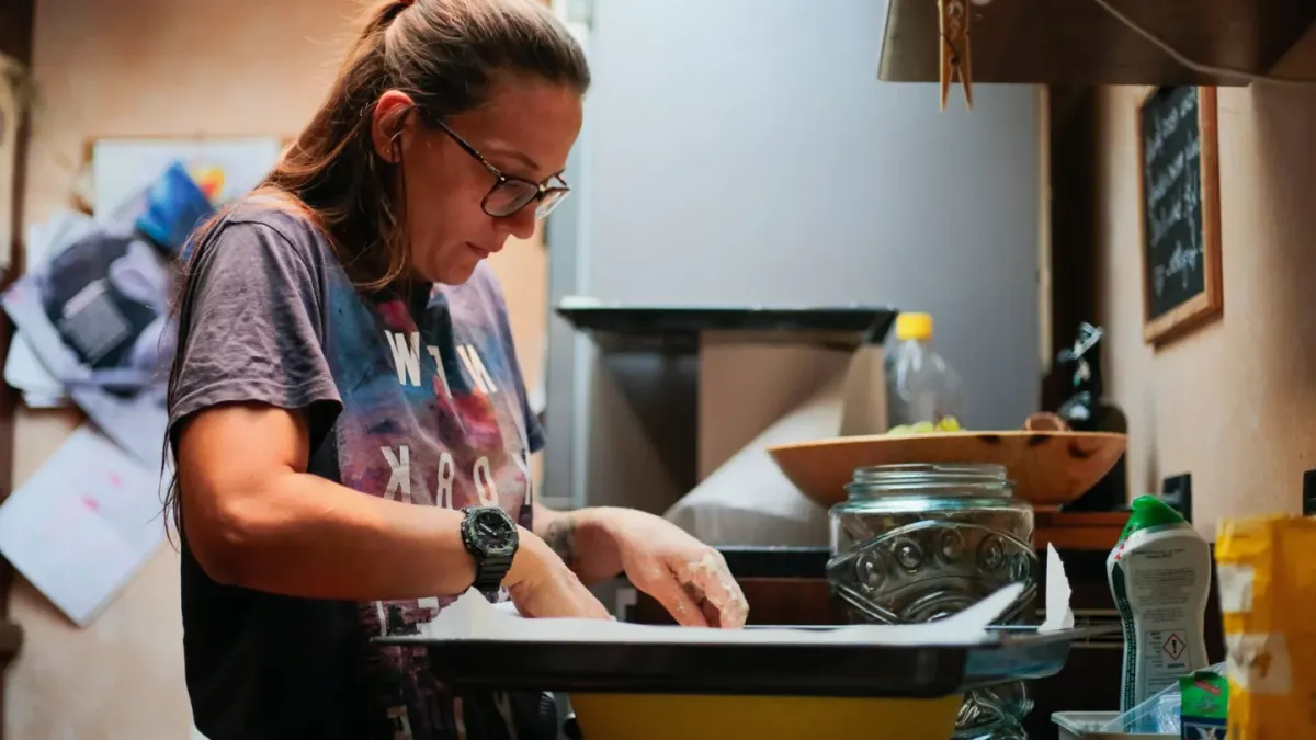 Dog owner preparing a meal
