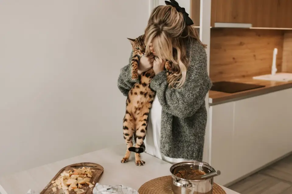 Dog owner preparing a meal