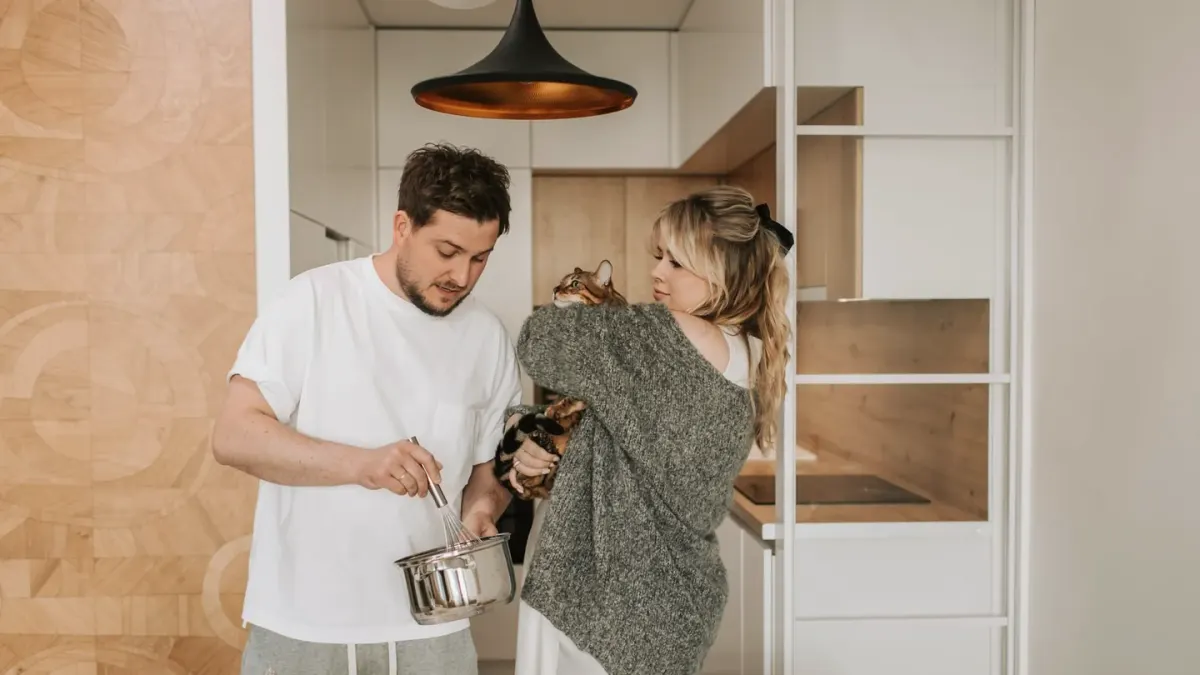 Dog owner preparing a meal