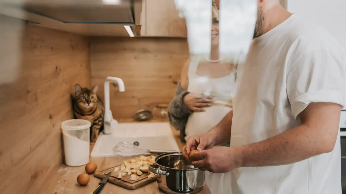 Dog owner preparing a meal