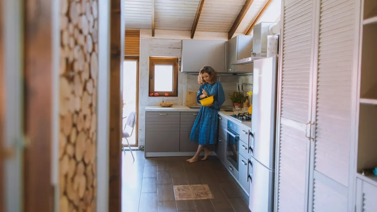 Dog owner preparing dog food kitchen