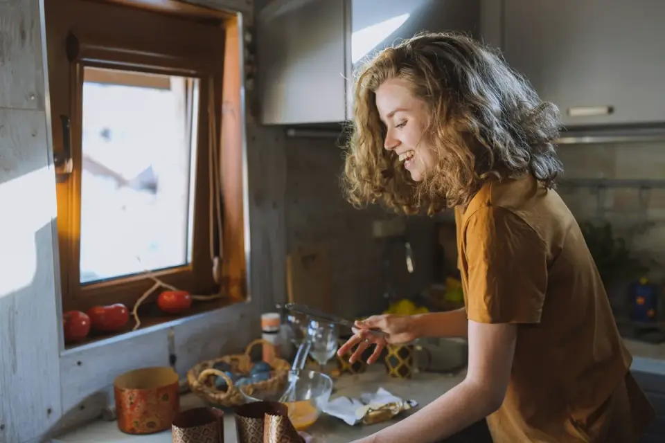 Dog owner preparing dog food kitchen