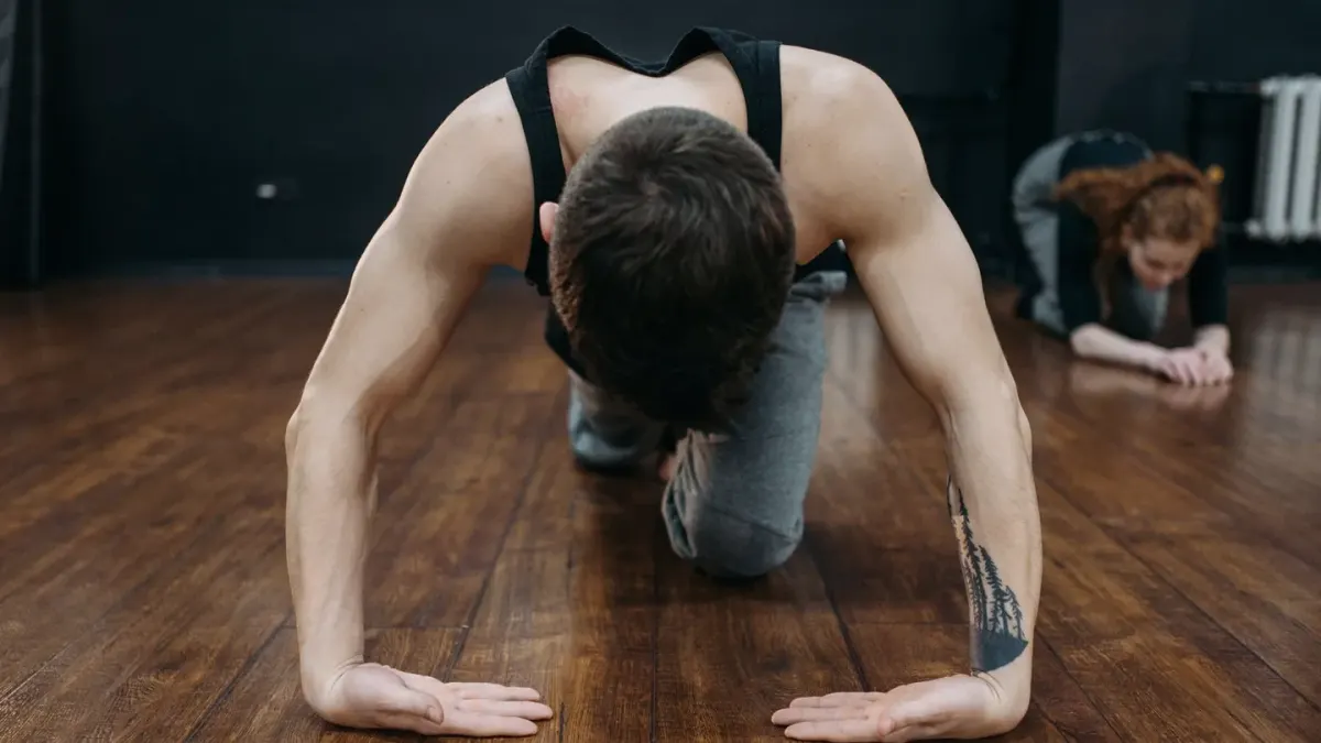 Dog stretching indoors