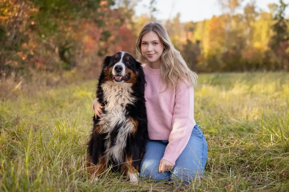 Owner helping a senior dog